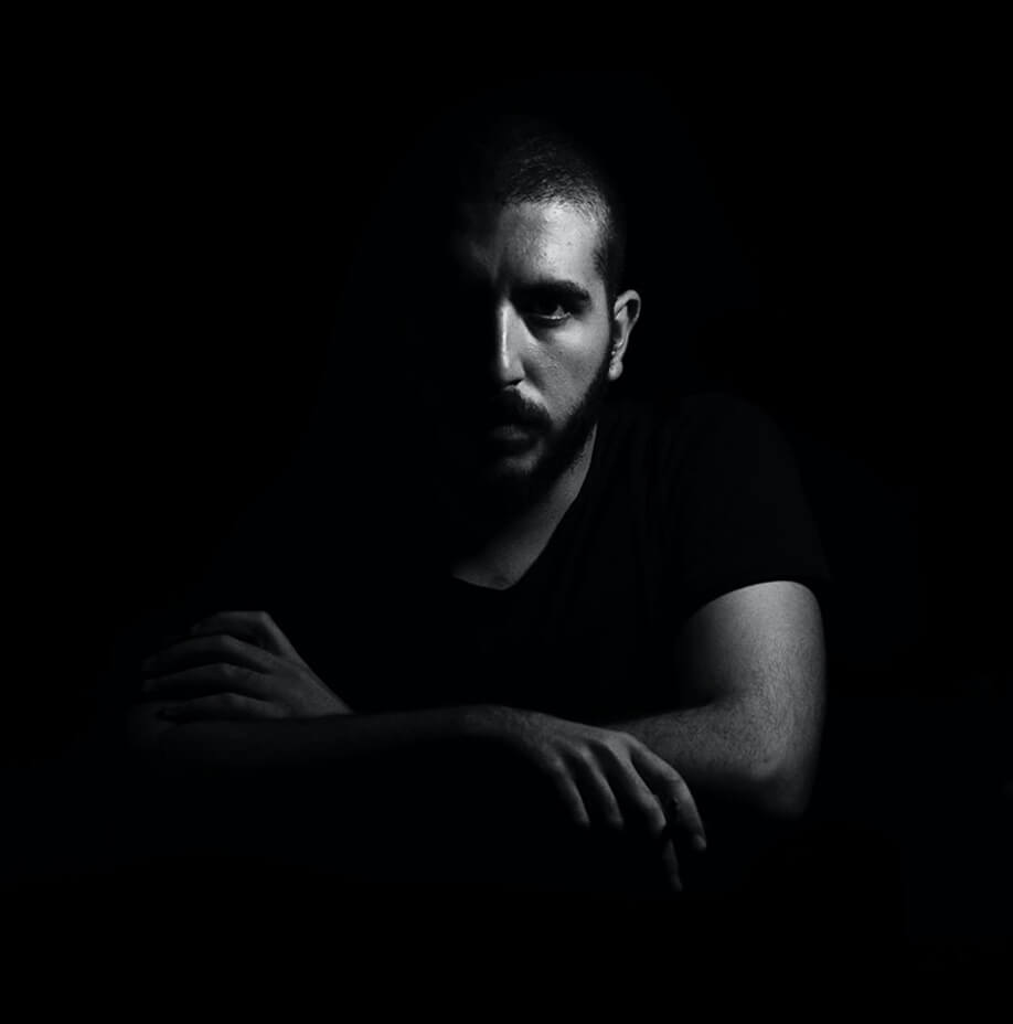 Team member on dark background